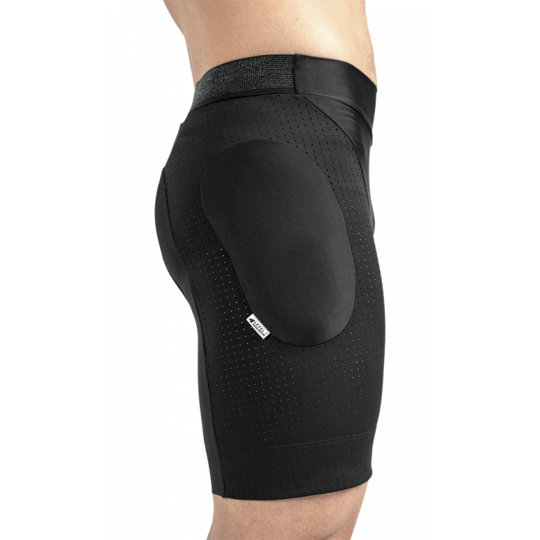 Rider wearing Bluegrass Aura protective undershorts on trail eMTB Essex