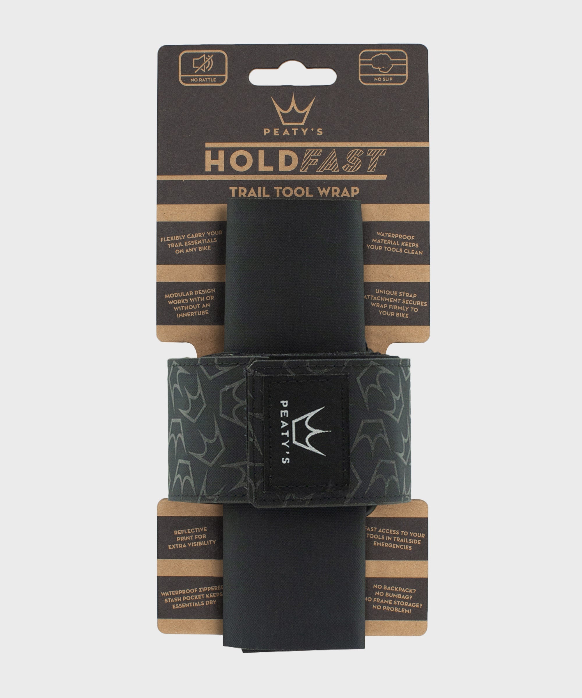 Peaty's HoldFast Trail Tool Wrap in Nightrider Black mounted to mountain bike frame showing modular strap attachment and waterproof zip pocket